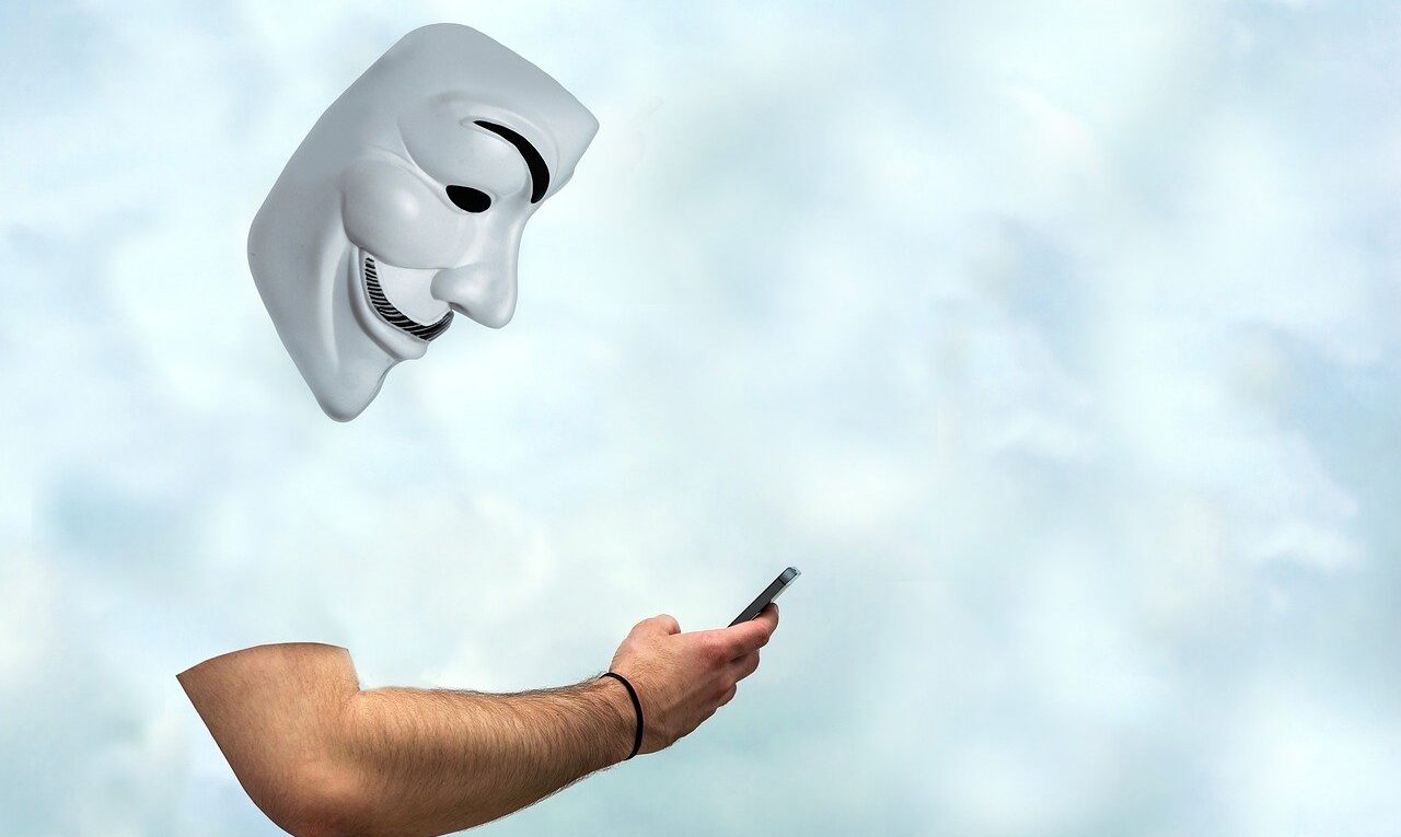 man, anonymous, phone, mask, arm, anonymity, smartphone, mobile phone, technology, concept, phone, mask, arm, arm, arm, arm, arm, smartphone